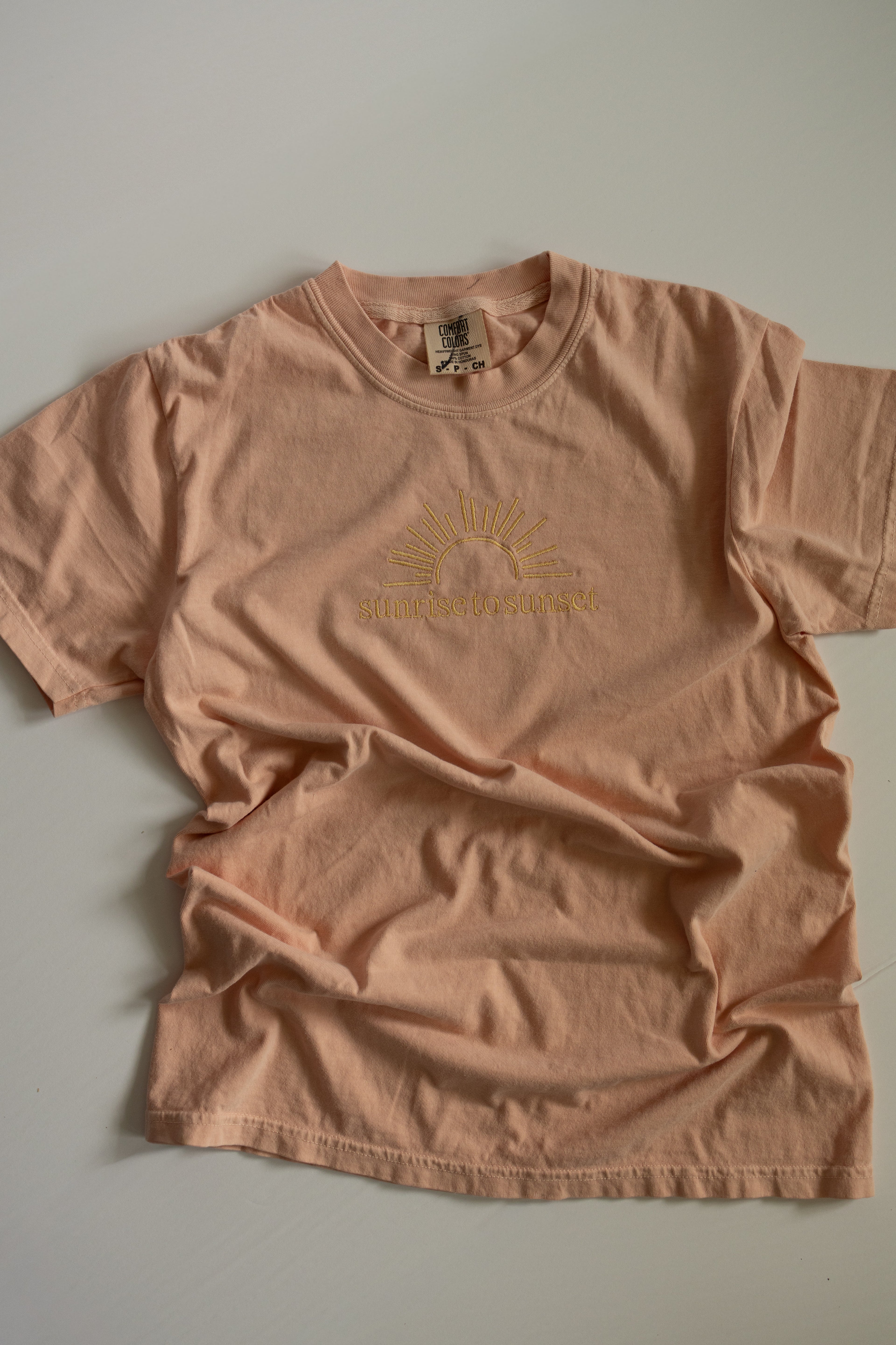 Sunrise to Sunset Embroidered Tee – Peach Comfort Colors T-Shirt (Psalm 113:3)